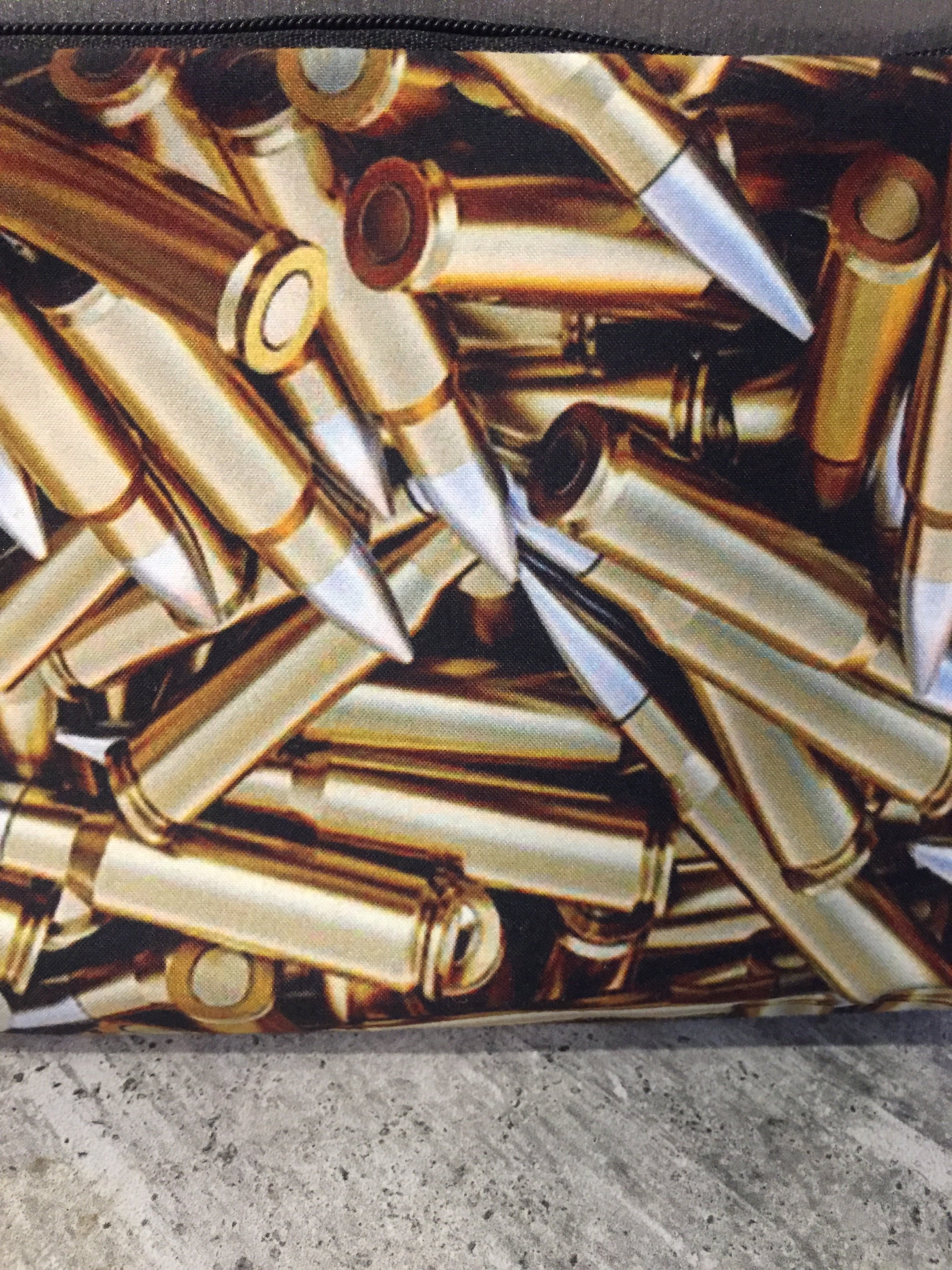 “Bullets” printed cosmetic/carry all bag